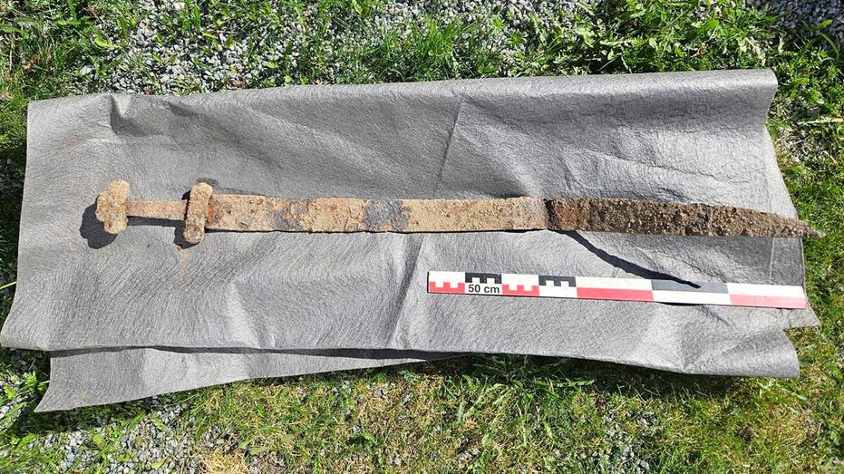 Ancient Viking sword discovered 'sticking up out of the ground' after 1,300 years